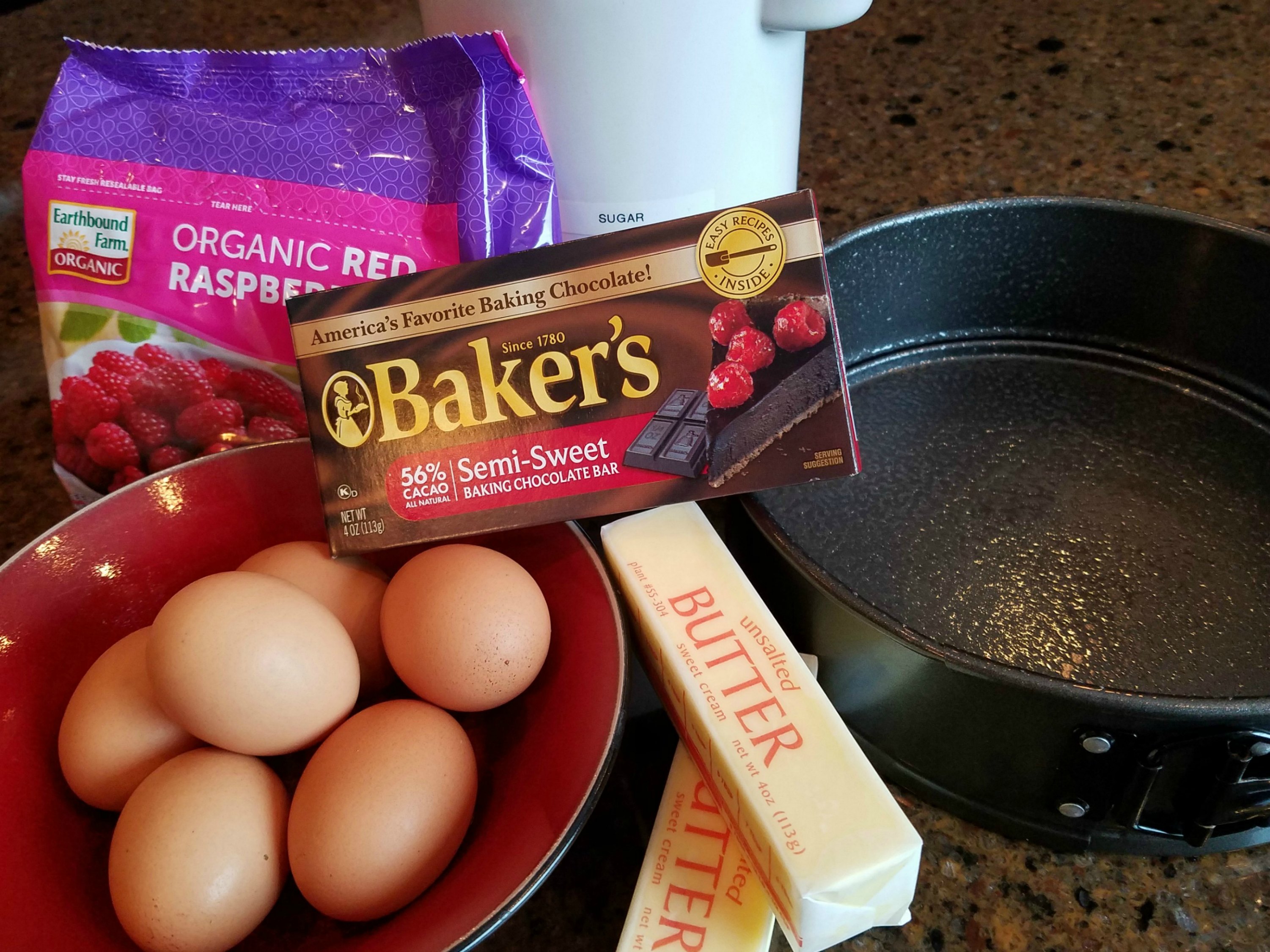 Ingredients for chocolate cake with raspberry sauce recipe