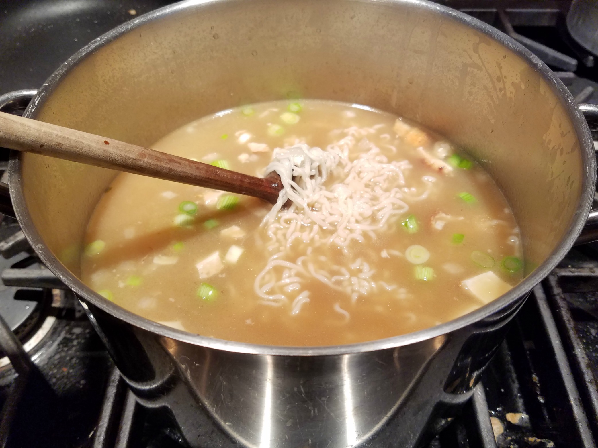 Asian Turkey Soup cooking on stovetop